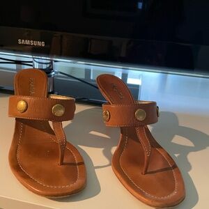 Prada thong w heel.  Natural color w three gold Prada on top.